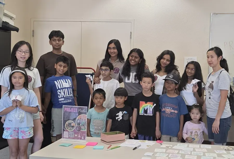 ProjectPatho volunteers with the children who came to the immune system workshop