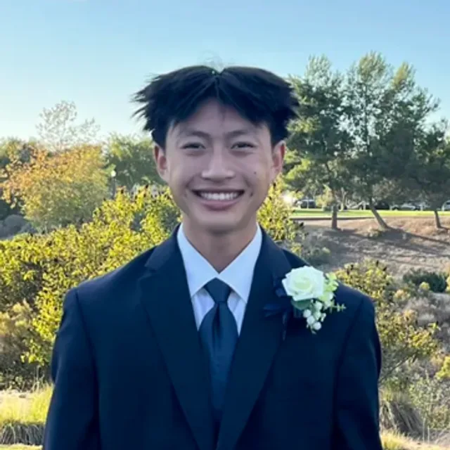 Headshot of Derek Tan